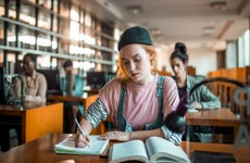 college student working in the library