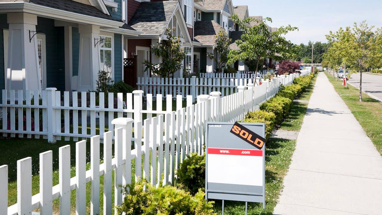 Sold sign near a house