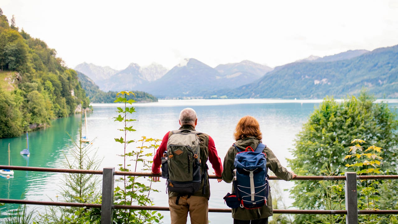 couple looking out at the view on a lake