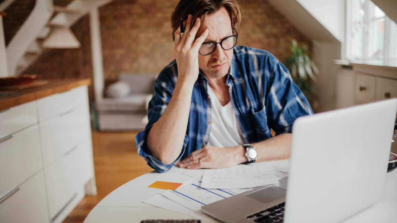 Photo of a man going through financials problems