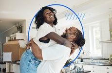 Two people hugging joyfully