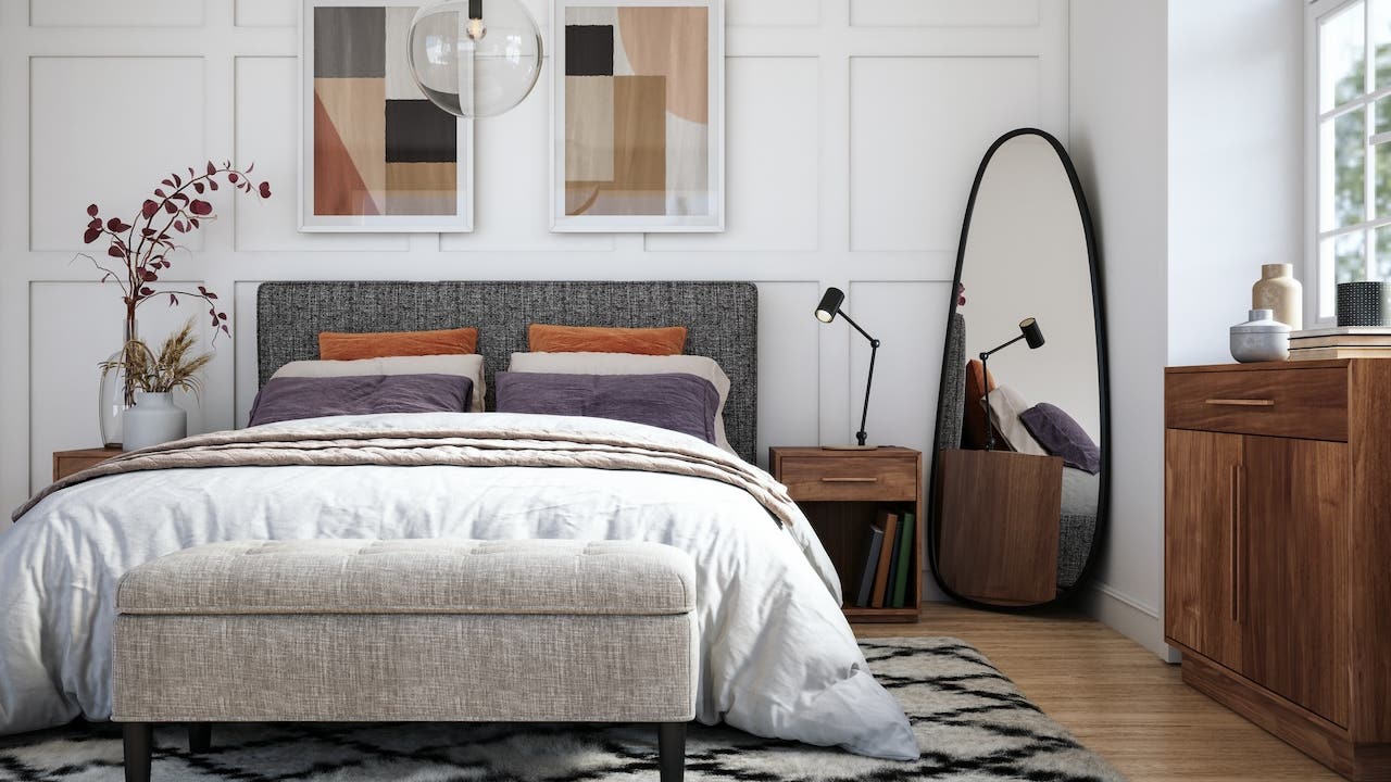 staged bedroom with modern furniture and bright window