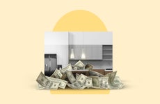 Image of money in front of a kitchen