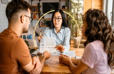 Image of a couple reviewing documentation