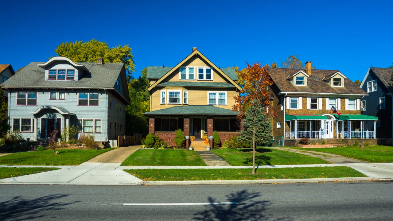 Three houses in a Cleveland, Ohio neighborhood.