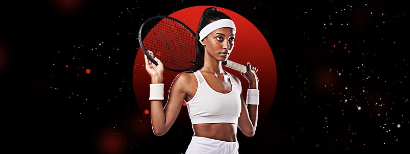 a female tennis player holding its racket