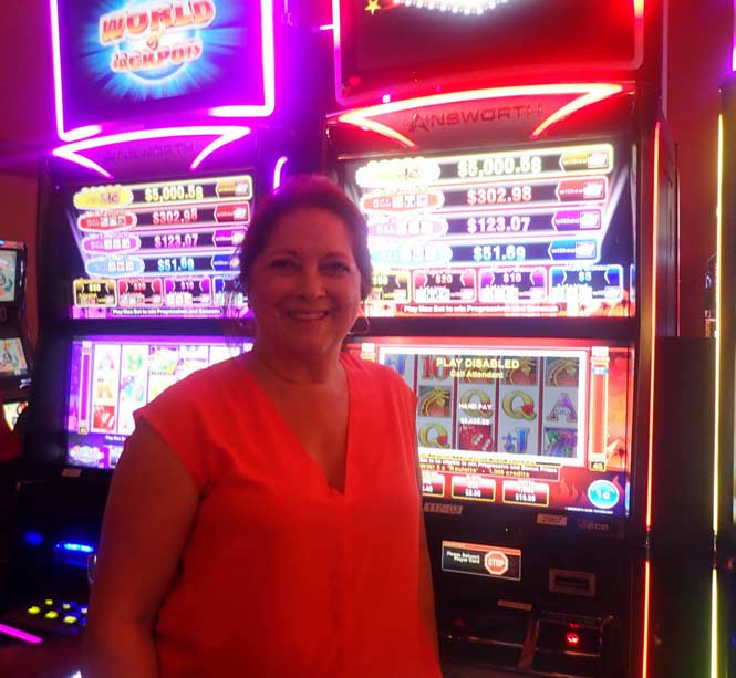 Jackpot Winner Magaly V. Acosta smiling