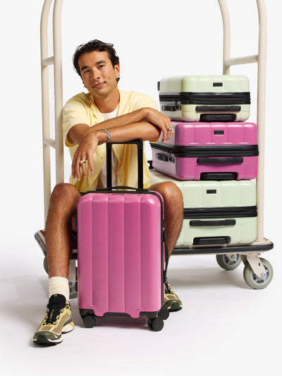 CALPAK Pacific blue carry-on luggage made from an ultra-durable polycarbonate shell and expandable by up to 2