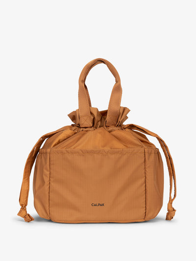 CALPAK lunch bag in brown; ALB2001-CAMEL view 1