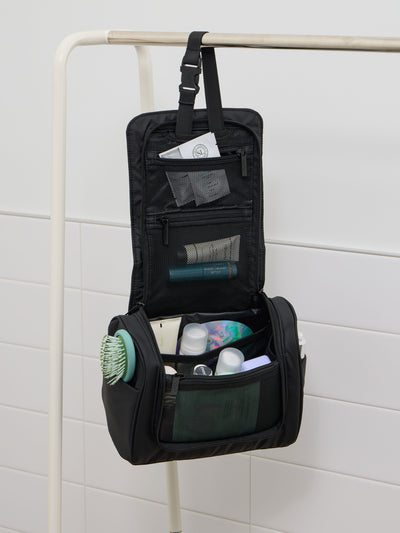 CALPAK Luka Hanging Toiletry Bag with carrying handle in matte black; TLH2301-MATTE-BLACK view 2