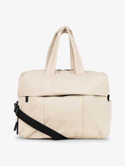 CALPAK Luka large duffle bag with detachable strap and zippered front pocket in oatmeal; DLL2201-OATMEAL view 1