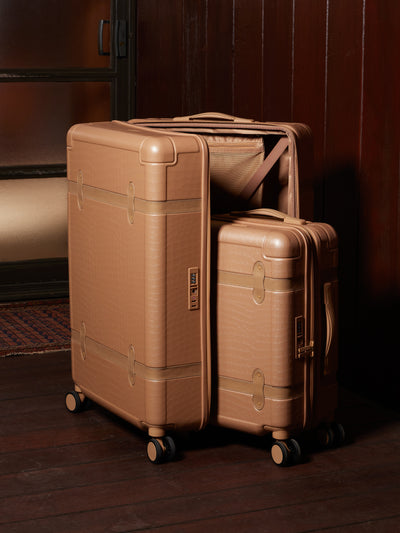 large 29 inch beige almond hard shell CALPAK TRNK suitcase with four 360 wheels in vintage trunk style; LTK1028-ALMOND view 2