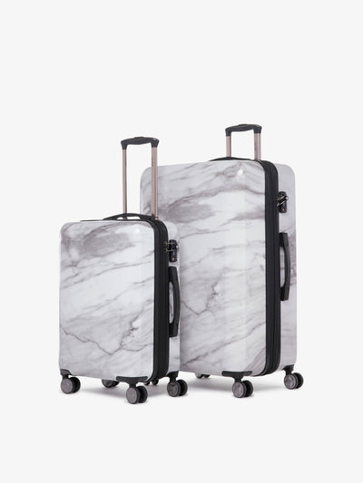 2 piece CALPAK Astyll white marble luggage set that includes carry on and large suitcase; LAT2000-MILK-MARBLE view 1