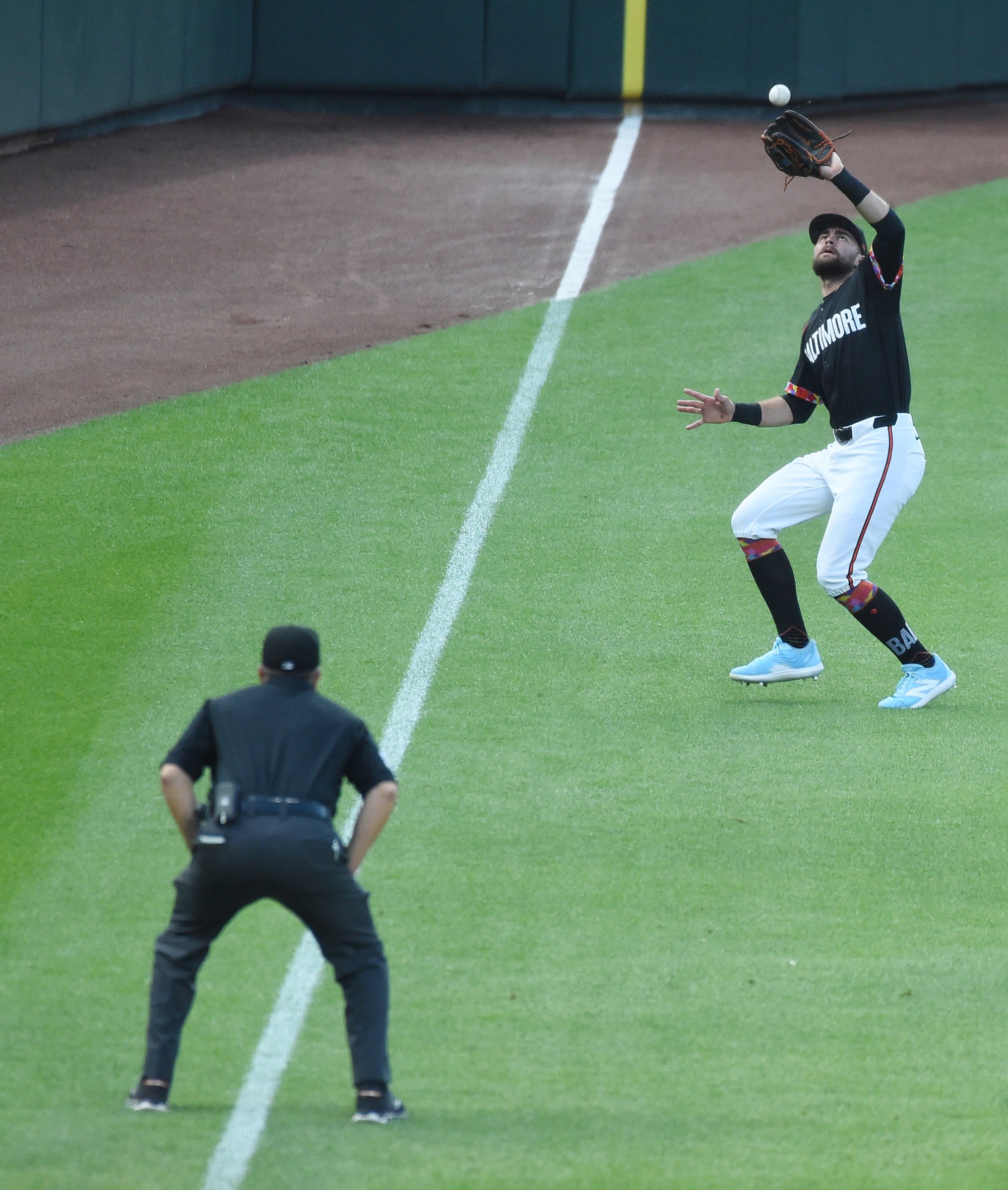 Orioles left fielder Colton Cowser catches a fly ball in the first inning against the Texas Rangers at Orioles Park at Camden Yards. (Kim Hairston/Staff)