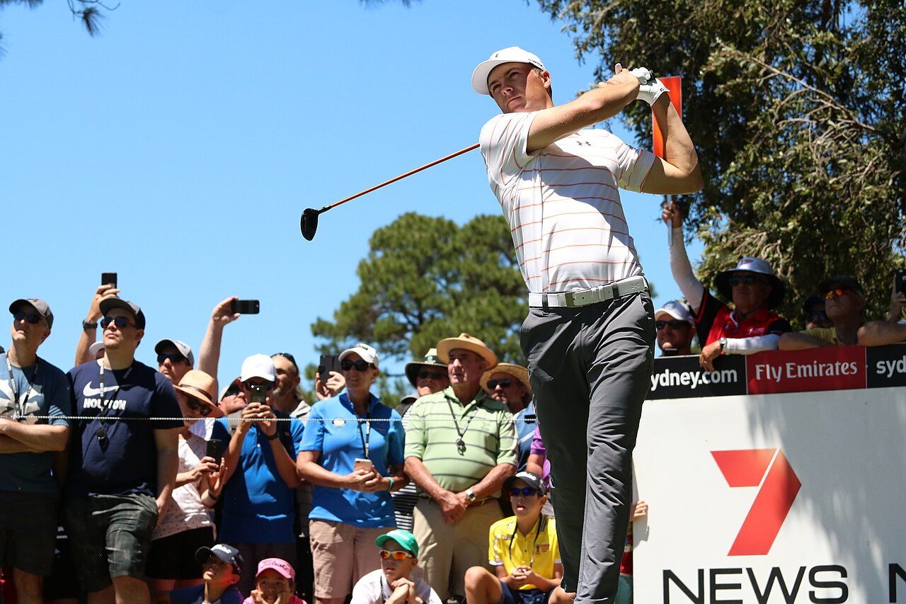 Jordan Spieth swinging a golf club at the Australian Open 