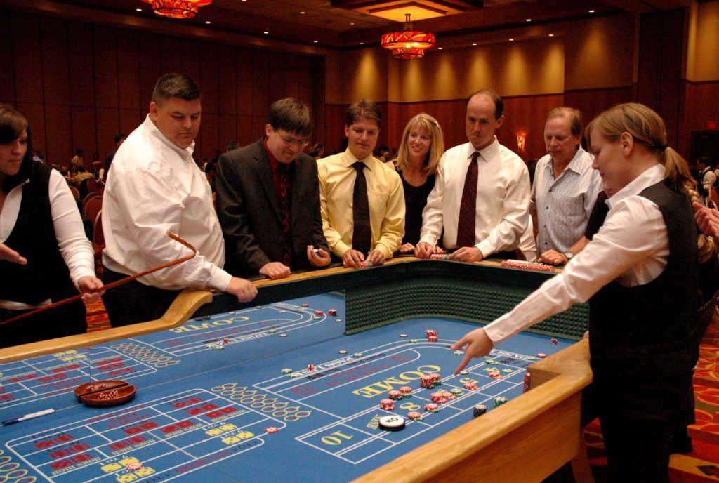 People playing the dice game; Craps