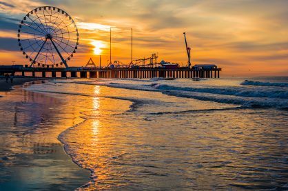 Sunrise reflection over the ocean. Atlantic City, New Jersey.