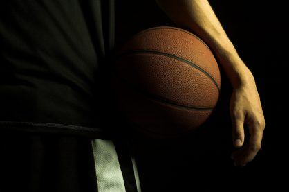 basketball player holding ball