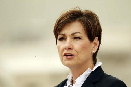 Iowa’s first female governor Kim Reynolds defends use of private jet