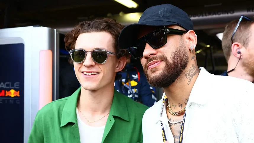 PSG soccer player Neymar (right) takes a photo with actor Tom Holland at the Monaco Grand Prix