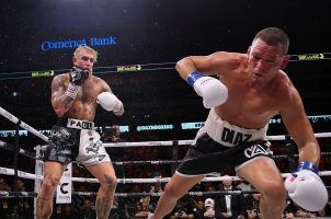 Nate Diaz takes a tumble during his boxing match against Jake Paul