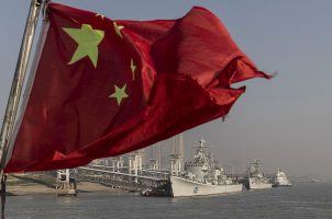 The Chinese flag flying from a ship