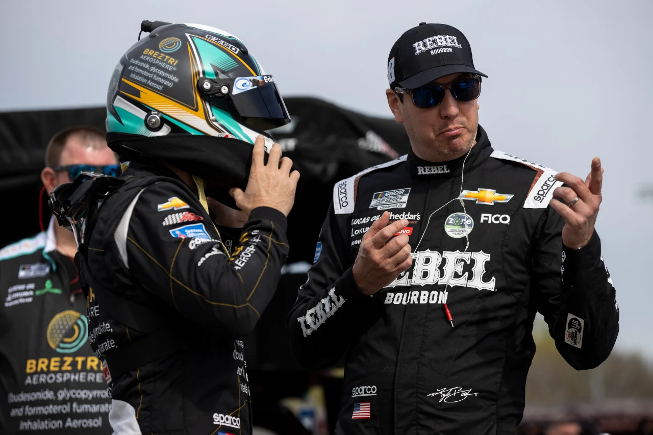 NASCAR Cup Series driver Kyle Busch (8) talks to NASCAR Cup Series driver Austin Dillon (3) during practice for the Toyota Owners 400 at Richmond Raceway.