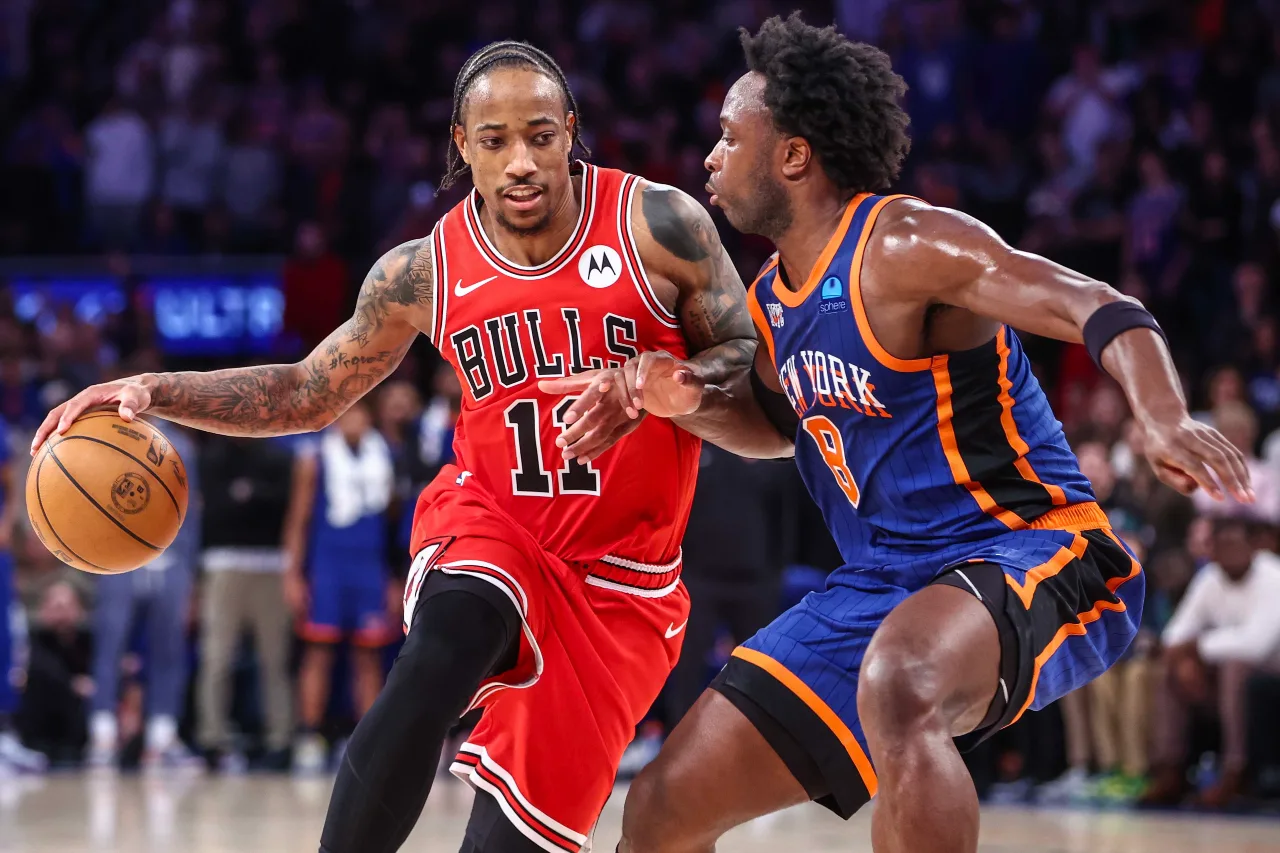 Chicago Bulls forward DeMar DeRozan (11) looks to drive past New York Knicks forward OG Anunoby (8) in the fourth quarter at Madison Square Garden