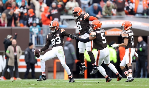 Cleveland Browns cornerback Martin Emerson Jr. celebrates his interception with Cleveland Browns defenders against the Jacksonville Jaguars in the first half of play.