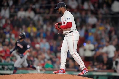 pitcher watches as batter rounds the bases on homer