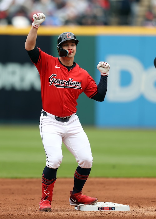 Cleveland Guardians right fielder Will Brennan reacts after hitting a double to left field against the Oakland Athletics in the fourth inning.