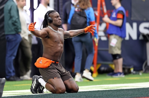 Cleveland Browns tight end David Njoku meditates on the field following warm ups prior to the game against the Houston Texans.