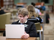 Senior Connor Walsh, 17, works on the computer during study hall at Holy Name High School in Parma Heights earlier this year. The school is a major user of tuition vouchers. (Lisa DeJong/The Plain Dealer)