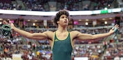 Jarrel Miller, of St. Edward, reacts after defeating James Scavuzzo, of Medina Highland, in the DI 157 pound class during the semifinal round of the state wrestling championships. 