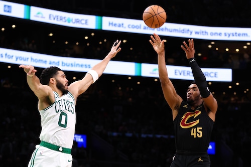 BOSTON, MASSACHUSETTS - MAY 09: Donovan Mitchell #45 of the Cleveland Cavaliers shoots the ball against Jayson Tatum #0 of the Boston Celtics during the second quarter in Game Two of the Eastern Conference Second Round Playoffs at TD Garden on May 09, 2024 in Boston, Massachusetts. NOTE TO USER: User expressly acknowledges and agrees that, by downloading and or using this photograph, User is consenting to the terms and conditions of the Getty Images License Agreement. (Photo by Maddie Meyer/Getty Images)