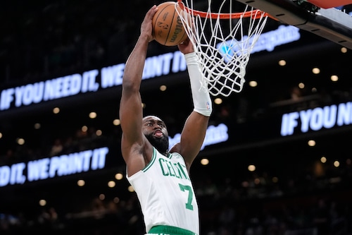 Boston Celtics guard Jaylen Brown dunks against the Cleveland Cavaliers during the first half of Game 2 of an NBA basketball second-round playoff series Thursday, May 9, 2024, in Boston. (AP Photo/Steven Senne)