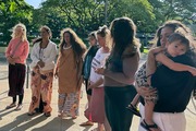 Supporters of a lawsuit challenging a Hawaii midwife licensure law gather outside a courthouse in Honolulu on Monday, June 10, 2024.  (AP Photo/Jennifer Sinco Kelleher)