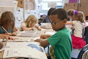 Youngsters hard at work, thanks to the YMCA of Greater Cleveland's Operation Backpack.