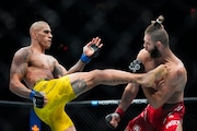 Brazil's Alex Pereira, left, kicks Czech Republic's Jirí Procházka. The two will fight again this Saturday. Learn about your streaming options.