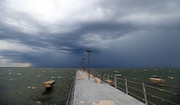 A line of storms moves inland from Lake Erie toward Cleveland and the surrounding suburbs, from Edgewater Park, in this Aug. 24, 2023, file photo. The National Weather Service has issued a flood watch for the region on Saturday.