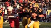 Avon quarterback Nolan Good scrambles for a first down Friday, Sept. 1, 2023, against Glenville at Mark Wahlberg Chevrolet Stadium in Avon. The Eagles beat Glenville, 24-16, to end the Tarblooders' 17-game winning streak.