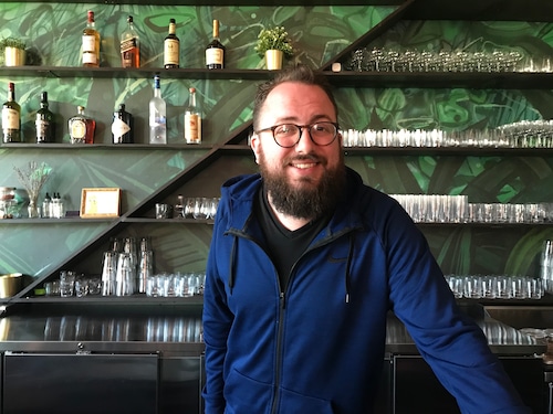 After five years in Clevelands Tremont neighborhood Will Hollingsworth has expanded his cocktail bar south to Akron.
