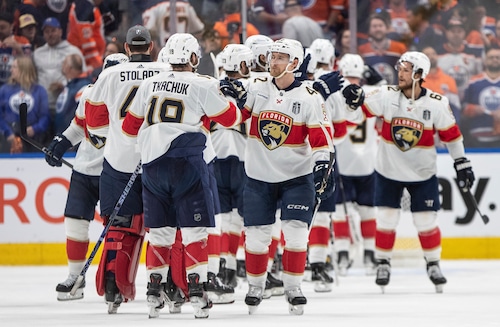 Florida Panthers players celebrate their win over the Edmonton Oilers in Game 3 of the NHL hockey Stanley Cup Finals, Thursday, June 13, 2024, in Edmonton, Alberta. (Jason Franson/The Canadian Press via AP)