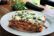 With a loaf pan and some sauce, it's easy to turn summer's zucchini into a cheesy lasagna. (Gretchen McKay/Pittsburgh Post-Gazette/TNS)