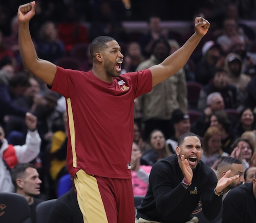 Cleveland Cavaliers center Tristan Thompson reacts to a break away score from the bench in the first half