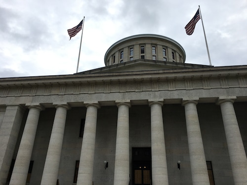 Boarded windows can be seen at the Ohio Statehouse May 29, 2020 after damage caused by protesters in Columbus