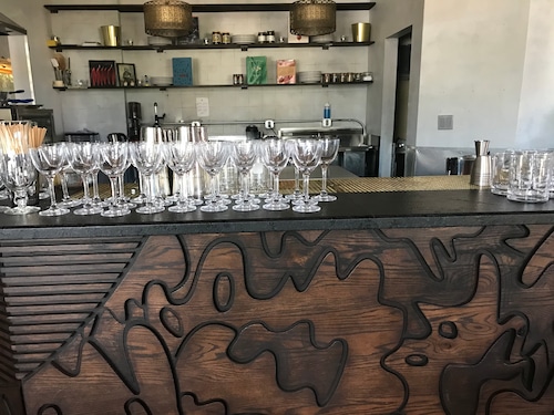 After five years in Clevelands Tremont neighborhood Will Hollingsworth has expanded his cocktail bar south to Akron.