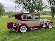 Of all of Curtis Perkins' classic automobiles, this 1930 Lincoln is his personal favorite. Note the freestanding trunk attached to the back bumper.