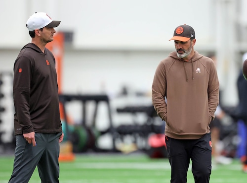 Cleveland Browns offensive coordinator Ken Dorsey and head coach Kevin Stefanski chat during rookie minicamp in Berea.