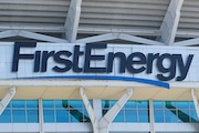 FILE - The signage for FirstEnergy Stadium is visible on the facade before an NFL preseason football game, Aug. 27, 2022, in Cleveland. The Ohio-based utility company says it's being investigated by a state office focused on organized crime in connection with payments the company made to the state's former House speaker and a top utility regulator, a news outlet reported Wednesday, Aug. 2, 2023. (AP Photo/Keith Srakocic, File)